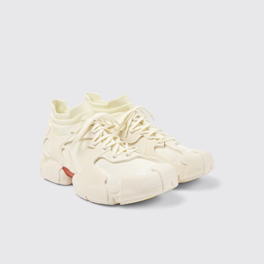 Front view of Tossu White caged sneakers